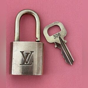 Louis Vuitton Gold Lock with Key